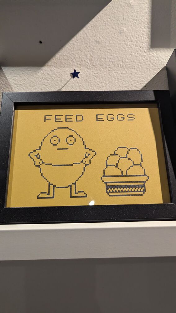 A pixel art image of the Feed Eggs video game from the Tim Robinson show click for full resolution.