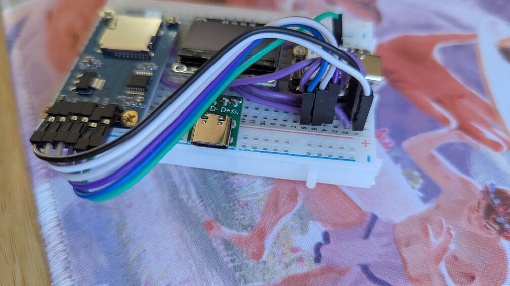 A breadboard posed in an artistic way. Lots of wires and electrical components. Part of the Iffy Books <a href="https://iffybooks.net/event/digital-notebook-may-22/">Digital Notebook</a> project (I helped with the firmware). click for full resolution.