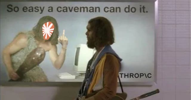 A photoshopped still from the So Easy A Caveman Can Do It geico commericals. A preppy caveman passes by an Anthropic ad, with the words 'So easy a caveman could do it'. The ad features a caveman flipping off the audience, with the Claude Code logo edited over his face.
