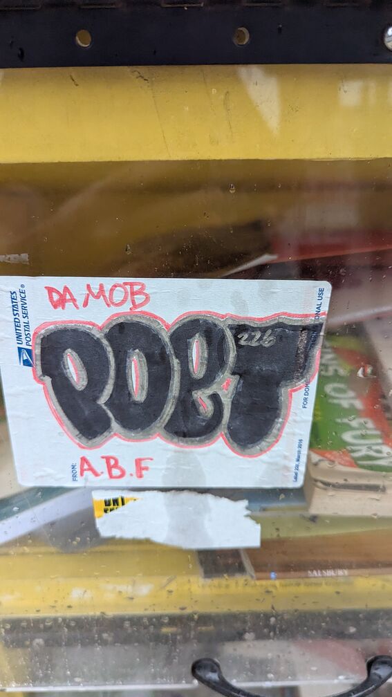 a grafitti slap that reads: DaMob A.B.F Poet click for full resolution.