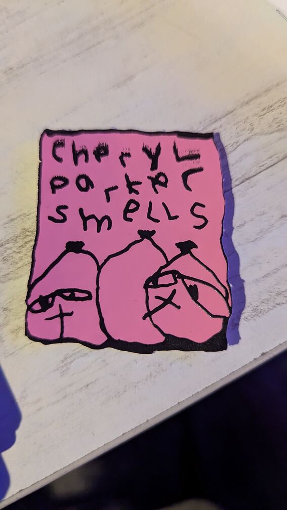 a drawing of trashbags with the words: Cheryl Parker smells click for full resolution.