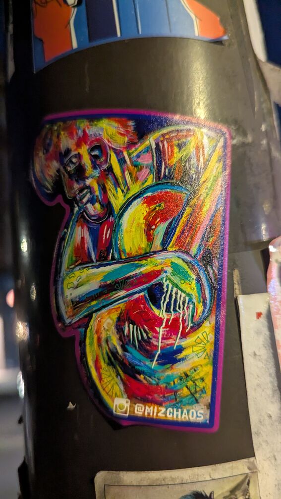 a psychadelic rendition of a man playing a guitar click for full resolution.