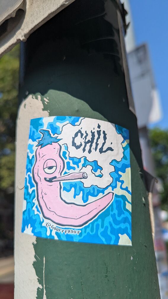 a chile pepper smoking a joint. Smoke from the joint forms the word: Chil click for full resolution.