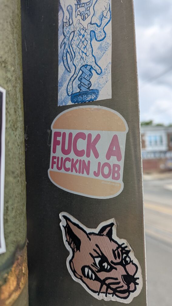 a parody of the Burger King logo, where the text reads: Fuck a Fucking Job click for full resolution.
