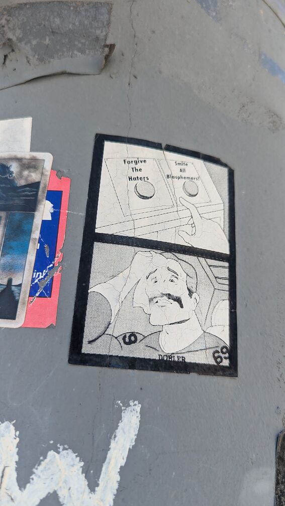 A dobler sticker, using the meme where the guy is choosing between two red buttons. One button reads 'Forgive the haters', the other 'smite all blasphemers!' click for full resolution.