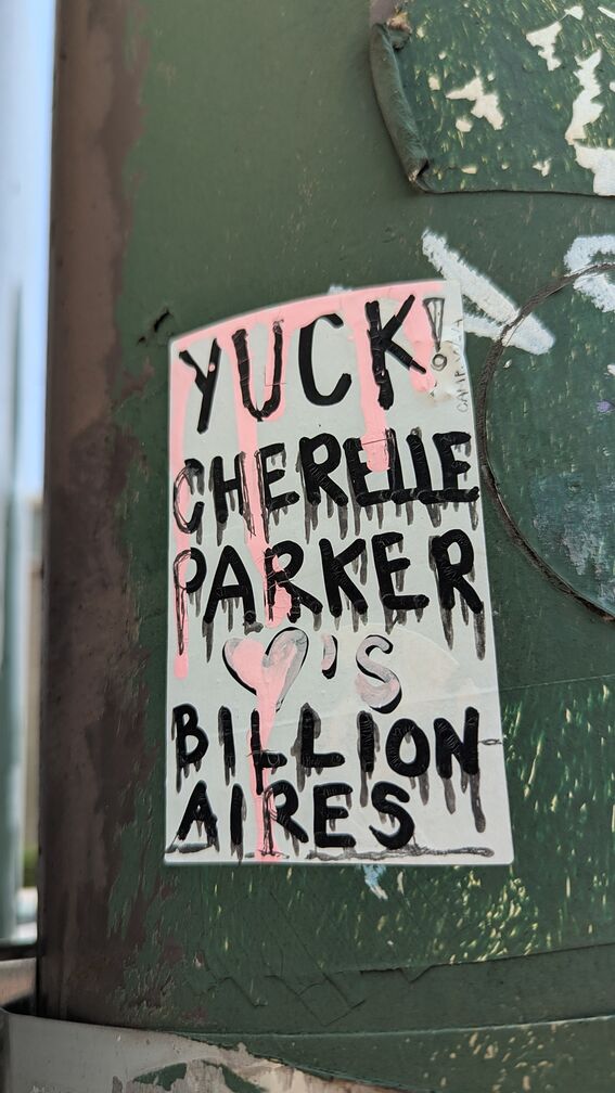 A sticker that says, in bleeding ink: Yuck! Cherelle Parker loves Billionaires click for full resolution.