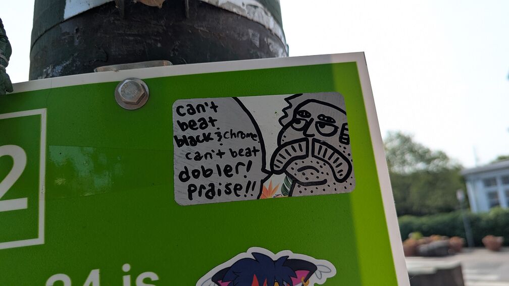 Another dobler sticker. Reads: can't beat black & chrome, can't beat dobler praise! click for full resolution.