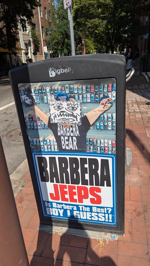 A barbara jeeps ad, but with the philly grafitti face plastered all over it click for full resolution.