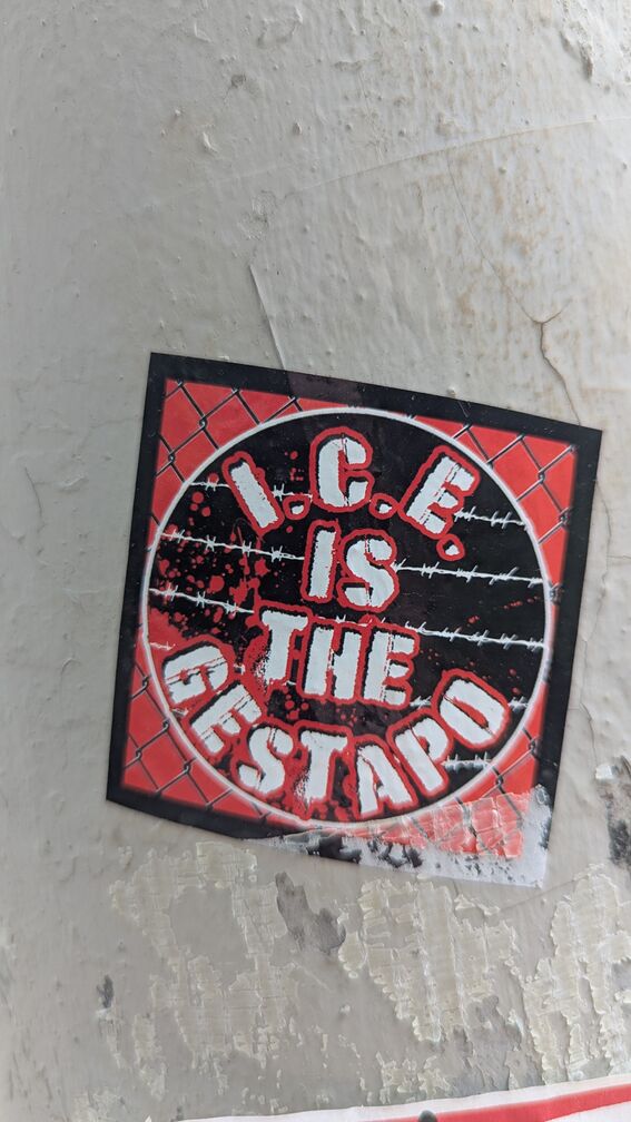 A sticker that has photos of chain link fences and barbed wire that reads: ICE is the gestapo click for full resolution.
