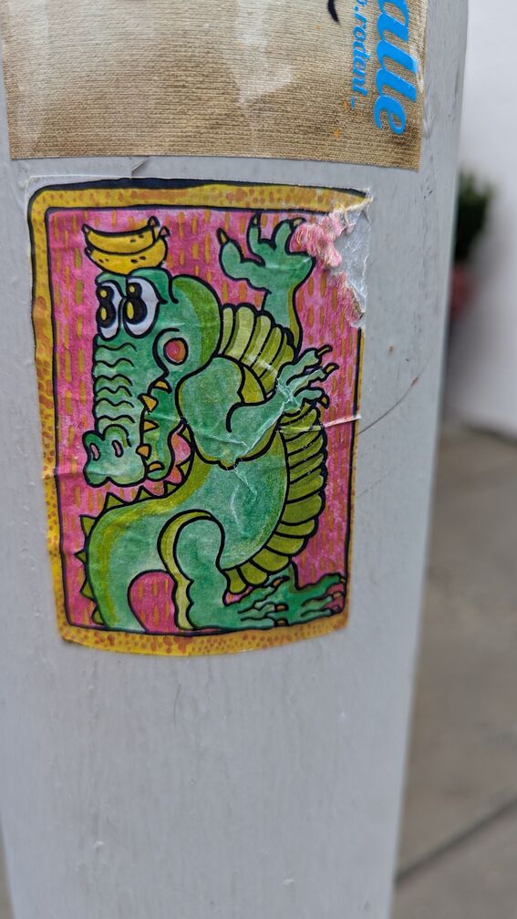 a coquettish alligator, with two pupils and two bananas on his head click for full resolution.