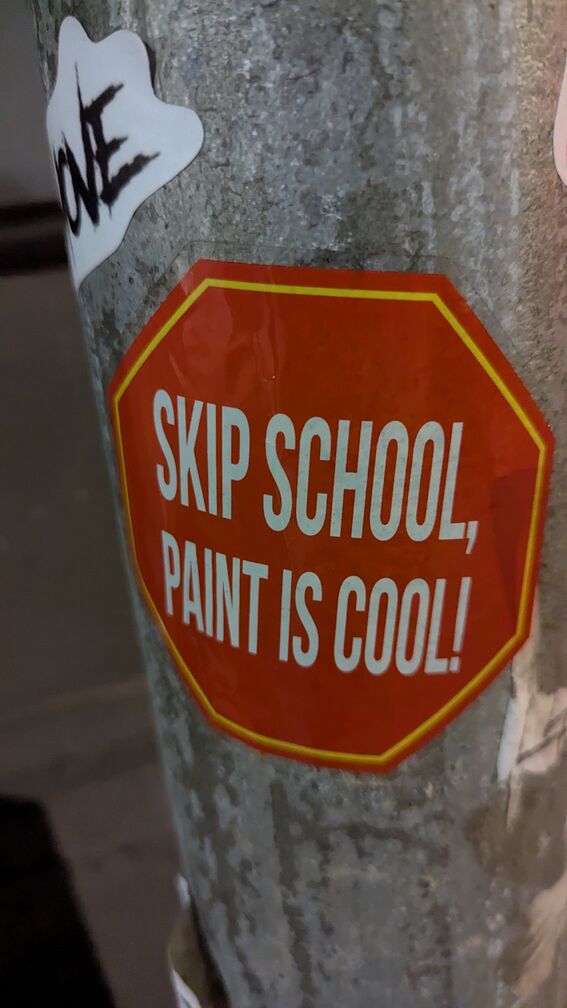 A fake stop sign sticker that says: skip school, paint is cool! click for full resolution.